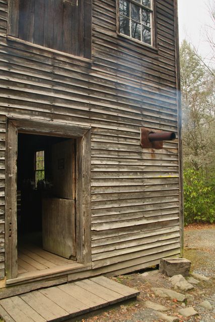 GSM_MingusMill -- Smoke from the wood header inside 