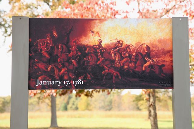 Sign depicting battle 
